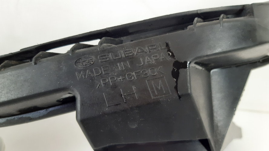 SUBARU XV I 11- ŚLIZG LAMPY SPRYSKIWACZ LEWY PRZÓD