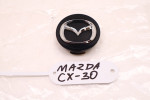 MAZDA XC-30 DEKIELEK EMBLEMAT BBM237190