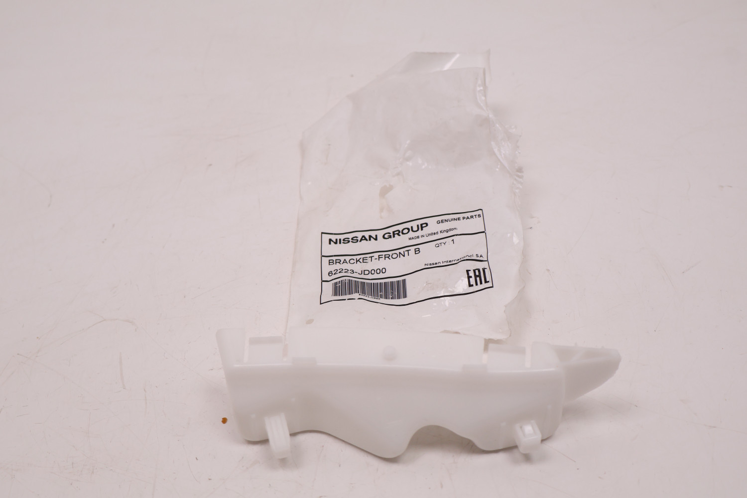NISSAN QASHQAI J10 ŚLIZG ZDERZAKA LEWY PRZÓD 62223-JD000