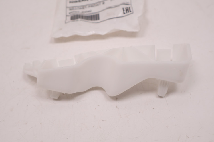 NISSAN QASHQAI J10 ŚLIZG ZDERZAKA LEWY PRZÓD 62223-JD000