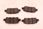 NISSAN QASHQAI KLOCKI HAMULCOWE TYŁ 44060-EG00K