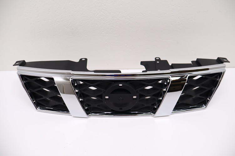 NISSAN X-TRAIL T31 GRILL ATRAPA ZDERZAKA 62310-JG50A