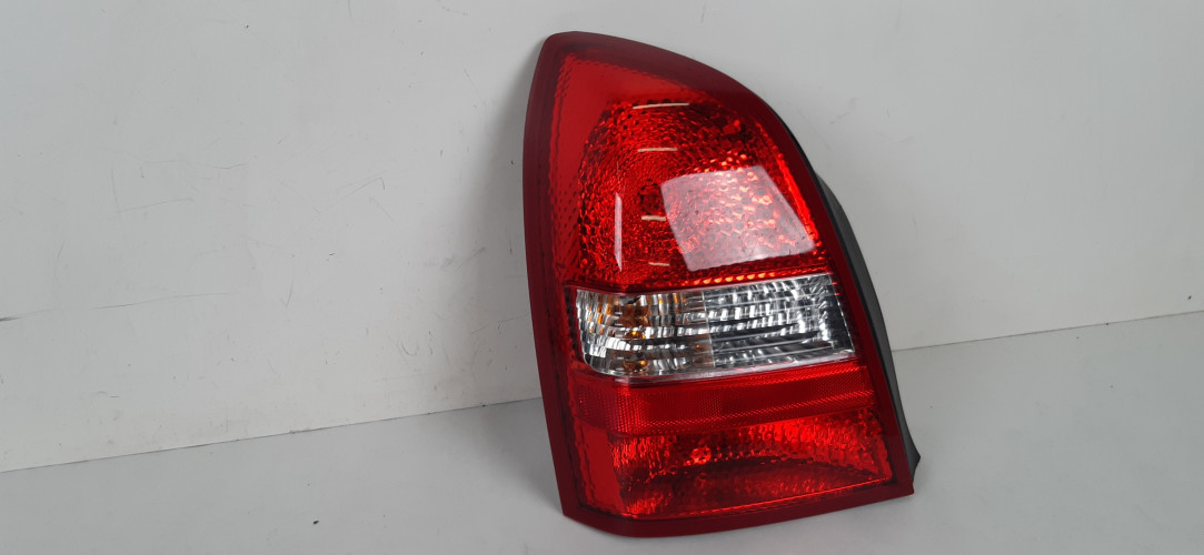 NISSAN PRIMERA P12 LAMPA LEWA TYŁ 89077082